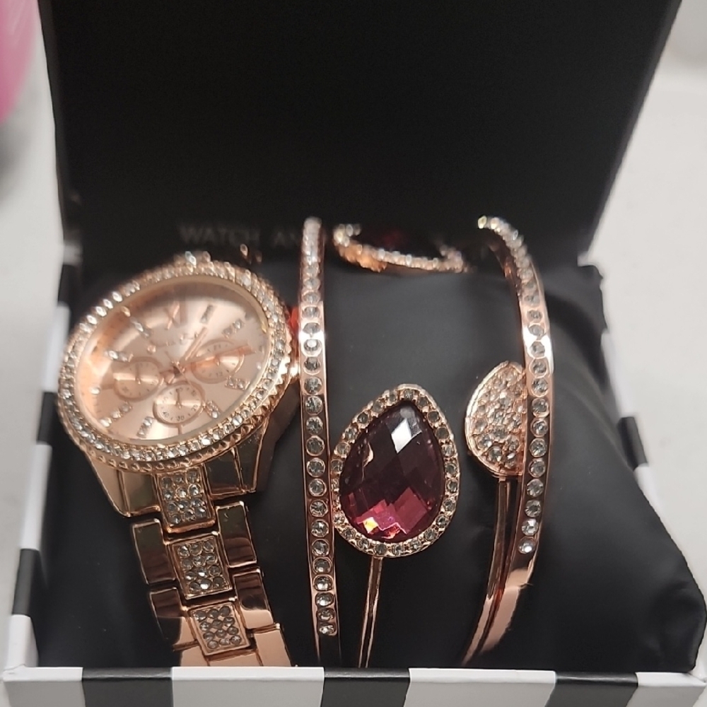 Gold and Red Watch with Gemstone Accents